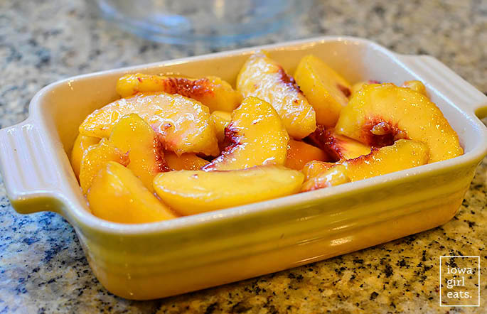gluten free peach cobbler in a baking dish