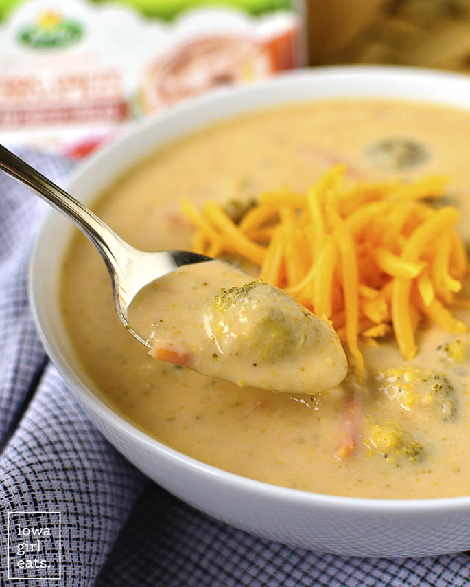 Crock Pot Broccoli-Cheddar Potato Soup is thick, creamy, and oh-so cheesy. This crock pot soup recipe is easy and gluten-free, too! | iowagirleats.com