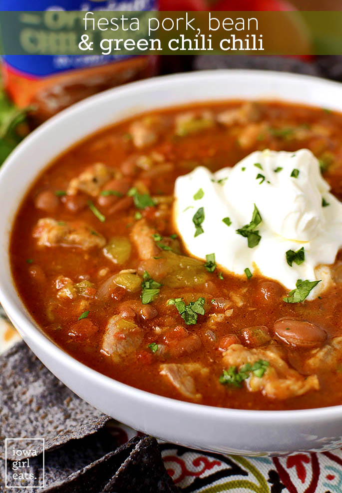 Fiesta Pork, Bean and Green Chili Chili has just the right amount of spice and sass. This filling chili recipe is perfect for cool nights or game day! | iowagirleats.com