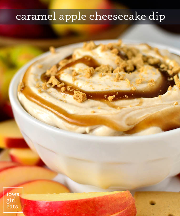 caramel apple cheesecake dip in a bowl drizzled with caramel sauce
