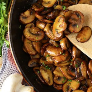 Garlic Butter Soy-Glazed Mushrooms is the easiest, most mouthwatering gluten-free side dish recipe I know! Serve with chicken, burgers, or baked potatoes. | iowagirleats.com