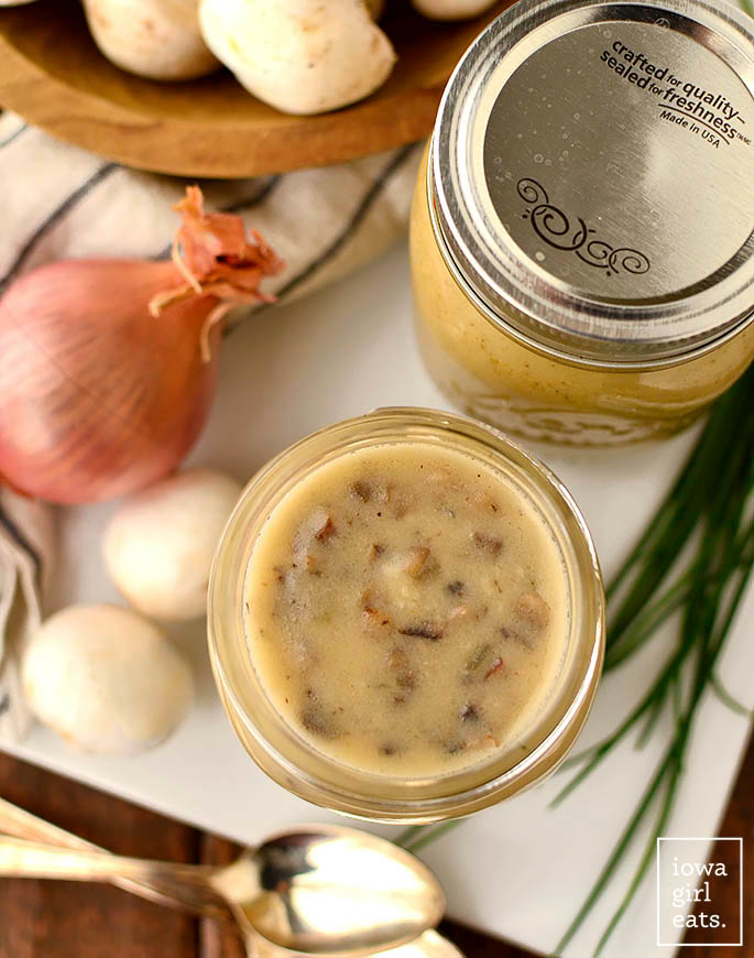 overhead photo of homemade gluten free cream of mushroom soup in a jar