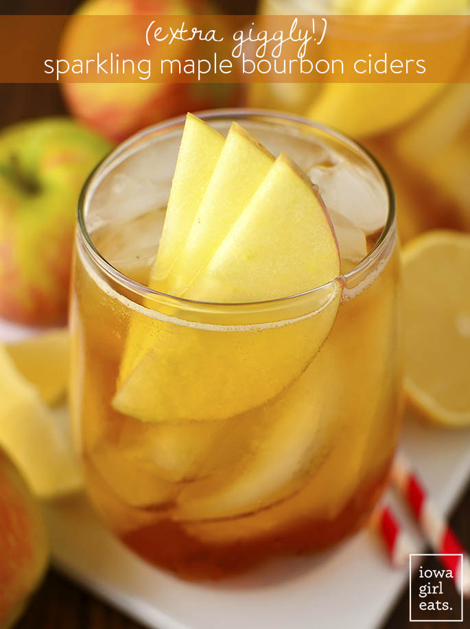 Sparkling Maple Bourbon Ciders are for when you're feeling extra giggly! Maple-swirled bourbon is topped with hard apple cider in this delicious, fall-inspired, 3-ingredient drink recipe. | iowagirleats.com