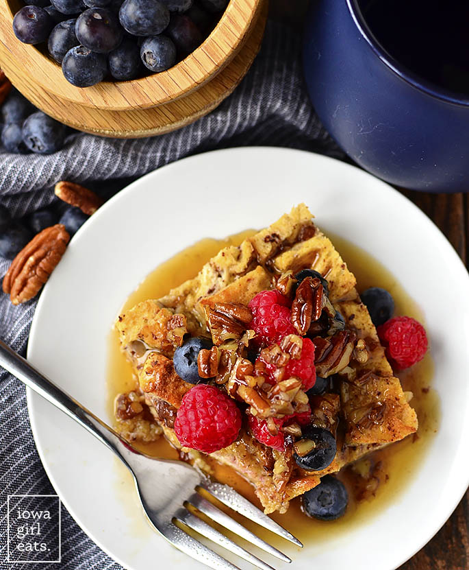 Gluten-Free French Toast Casserole with Butter-Pecan Maple Syrup is make ahead and perfect for feeding a crowd. This gluten-free breakfast or brunch recipe will WOW! | iowagirleats.com