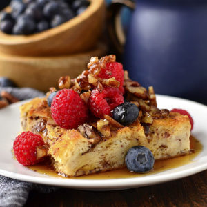 Gluten-Free French Toast Casserole with Butter-Pecan Maple Syrup is make ahead and perfect for feeding a crowd. This gluten-free breakfast or brunch recipe will WOW! | iowagirleats.com