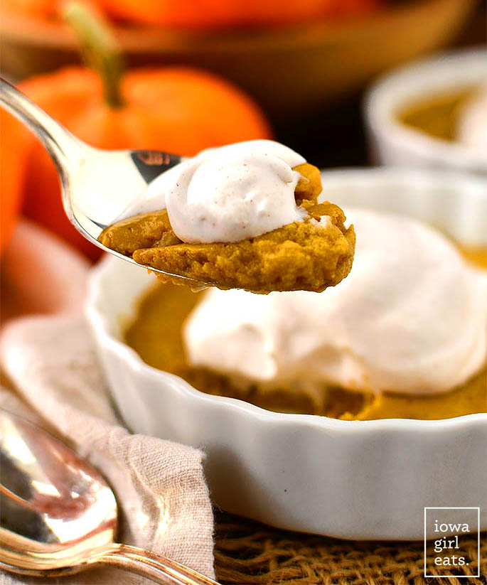 spoonful of crustless pumpkin pie with whipped topping
