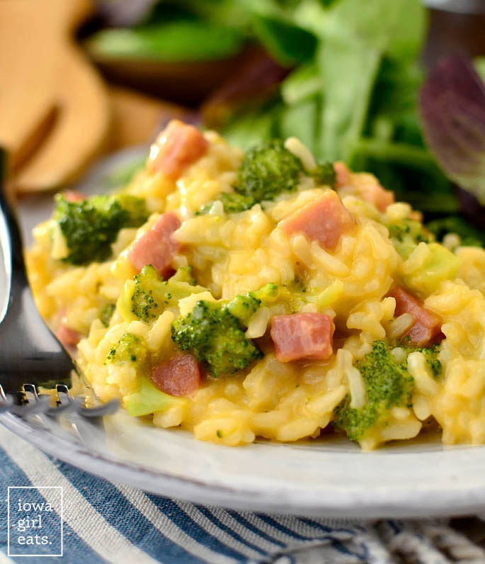scoop of cheesy ham and broccoli rice skillet on a plate