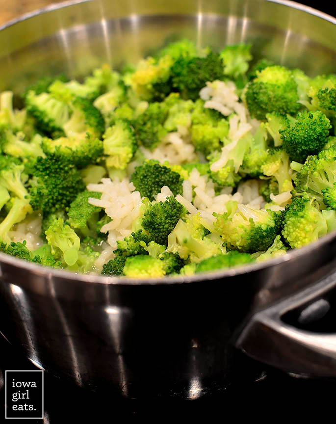 broccoli and cooked rice in a pot