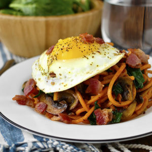 Spinach, Bacon and Mushroom Sweet Potato Noodles is a healthy and filling, 1-skillet dinner recipe that's packed with vegetables. Cooks in under 20 minutes, too! | iowagirleats.com