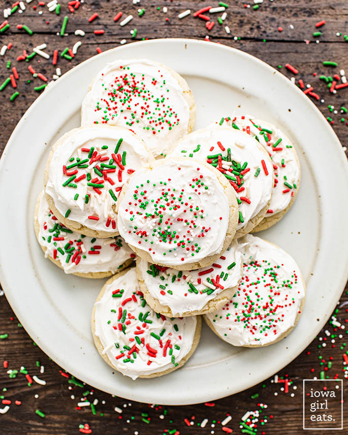 frosted gluten free sugar cookies on a plate