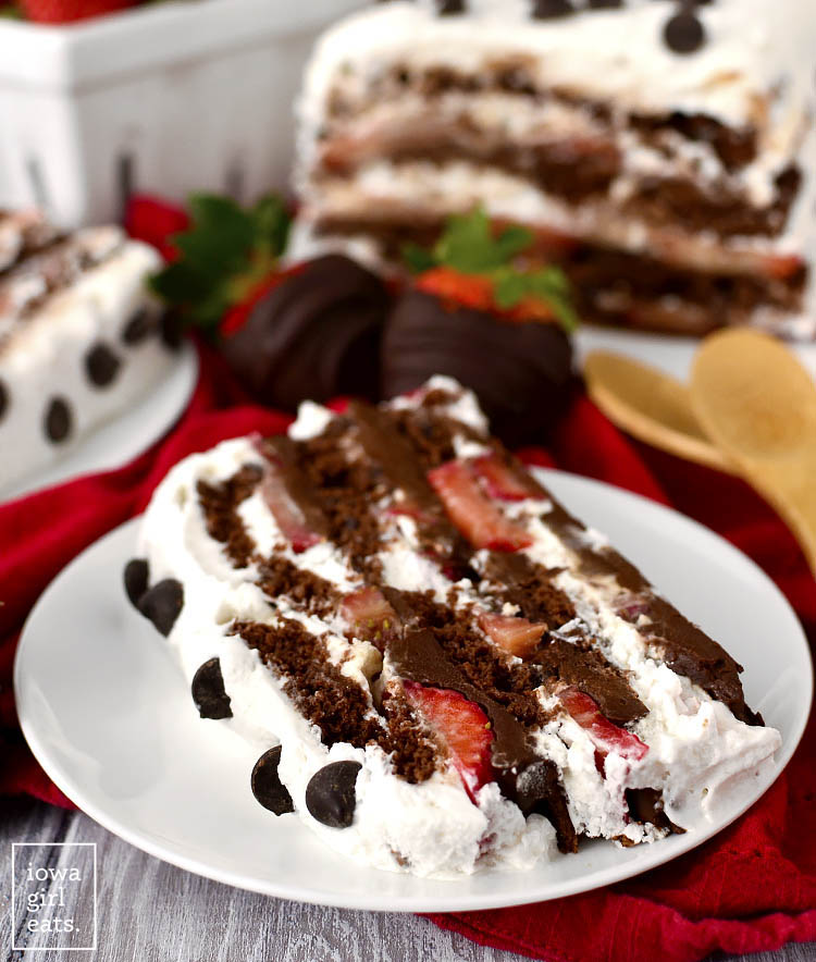 Chocolate-Covered Strawberry Icebox Cake is for serious chocolate lovers only! This gluten-free, dairy-free dessert recipe is decadent, sweet, and packed with chocolate. | iowagirleats.com