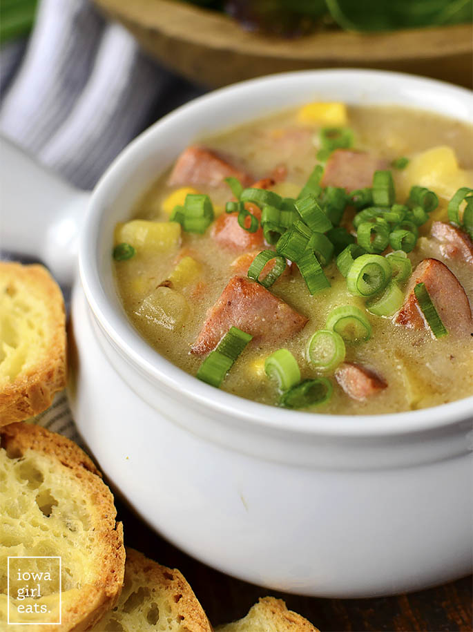 Sweet Corn, Kielbasa and Potato Soup is for the coldest of nights! This hearty and comforting, gluten-free soup recipe is filled with sweet corn, savory kielbasa and bacon, and creamy potatoes. | iowagirleats.com