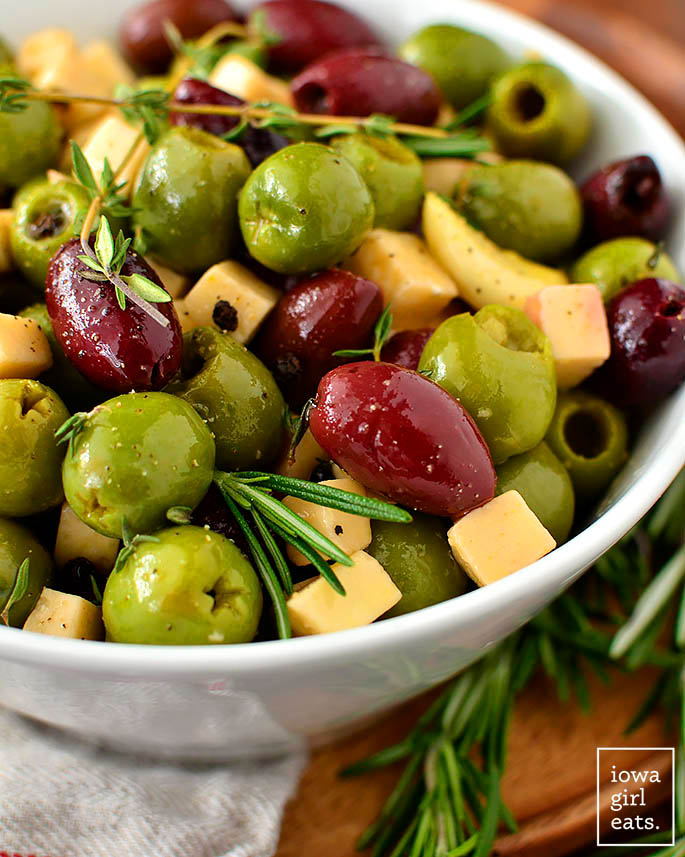 marinated olives and cheese in a serving bowl