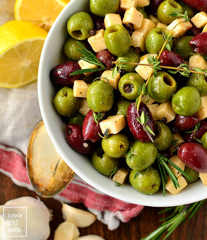 marinated olives and cheese in a serving bowl
