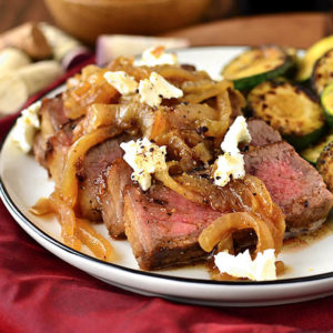 Pan-Roasted Steak with Caramelized Onions and Goat Cheese