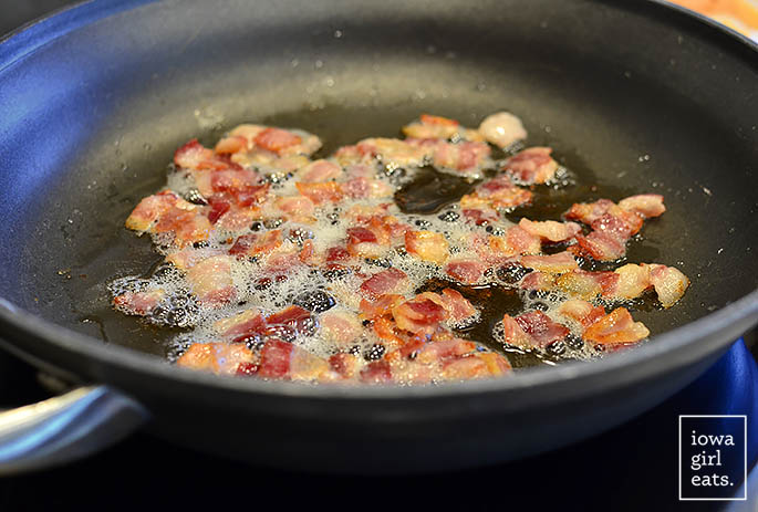 skillet of sizzling bacon