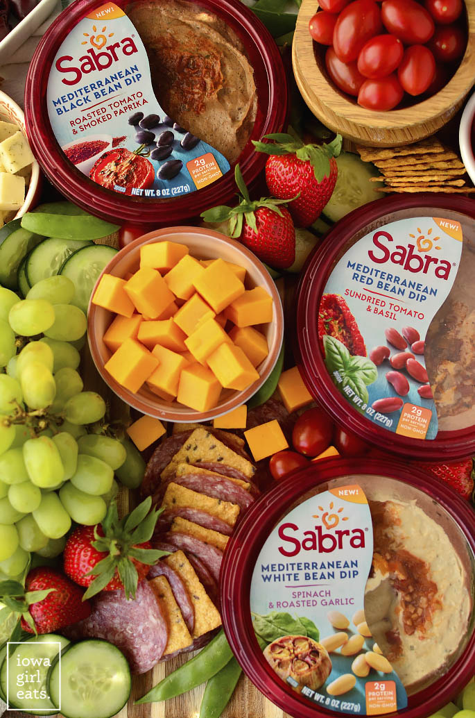 Platter of Sabra Bean Dips, cheese, and fruit.