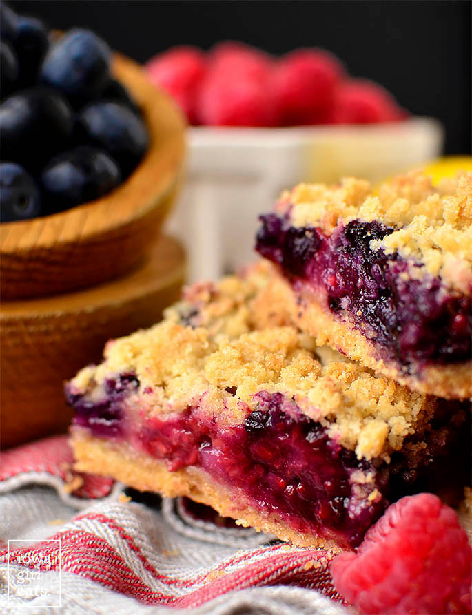 Side view of gluten-free Triple Berry Crumb Bars