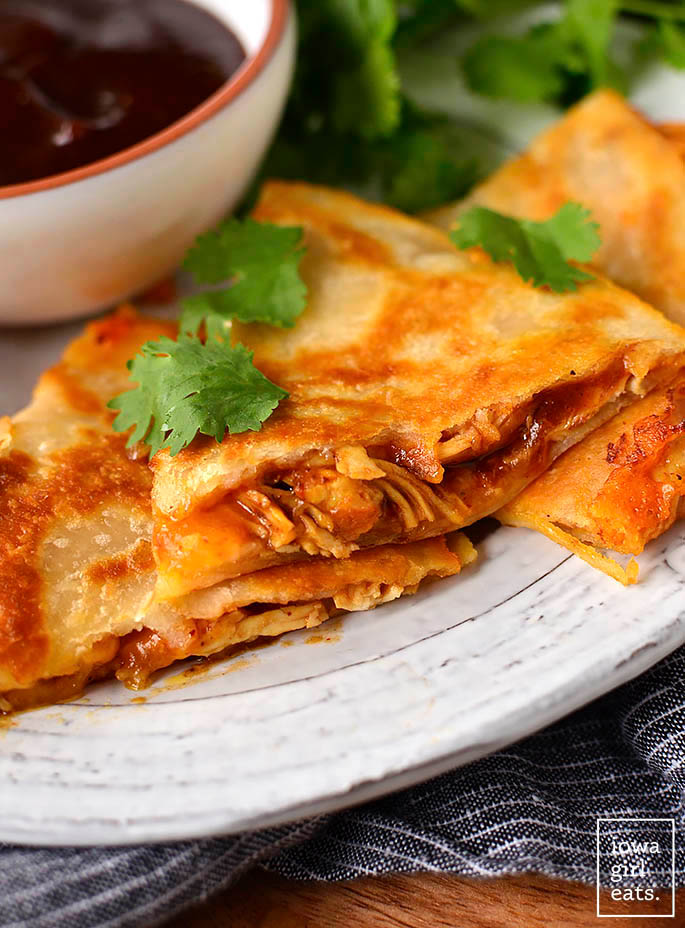 sliced bbq chicken quesadillas on a plate