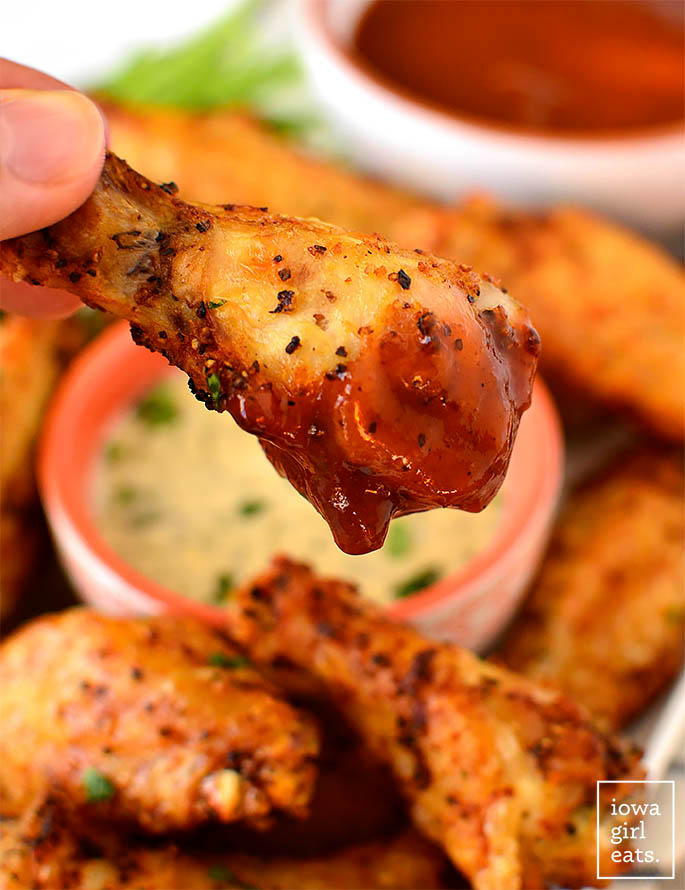 Air Fryer Chicken Wings dipped in BBQ sauce