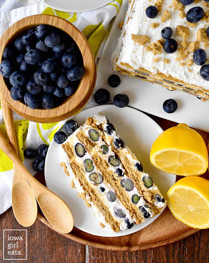 overhead photo of a slice of blueberry lemon icebox cake on a plate