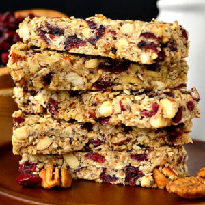 homemade chewy granola bars stacked on top of each other
