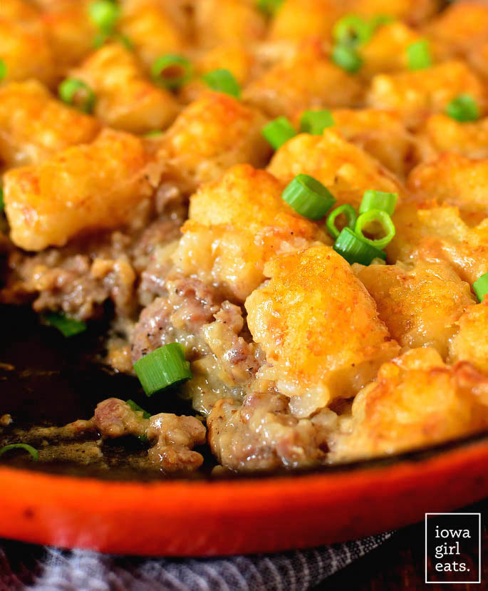 Close up of Sausage Gravy Breakfast Tater Tot Casserole in the skillet