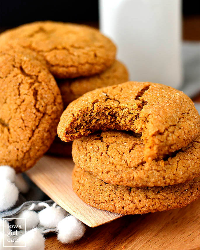 Chewy Gluten Free Ginger Molasses Cookie with a bite taken out of it.