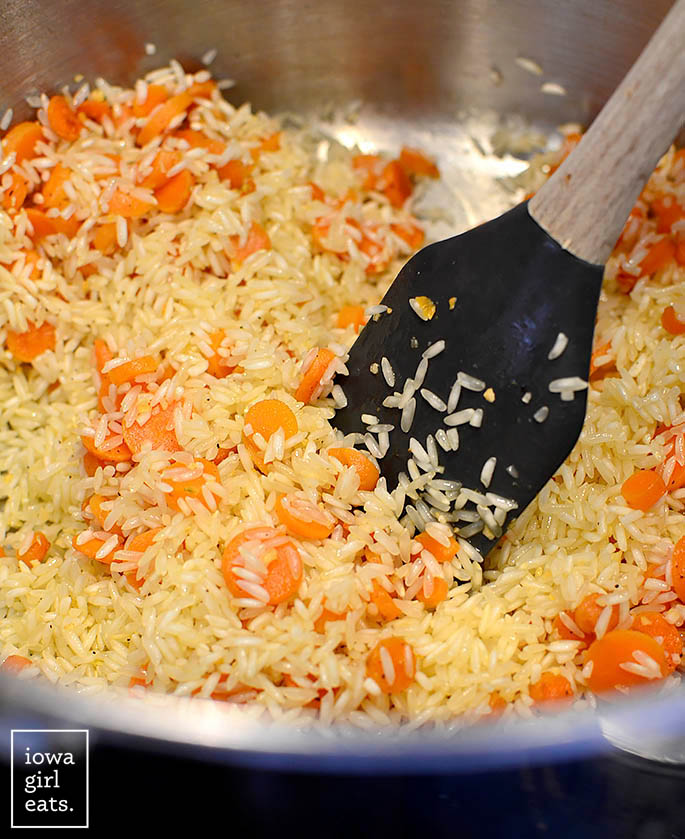 rice and carrots sauting in butter