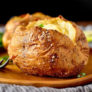 steaming easy baked potato on a plate