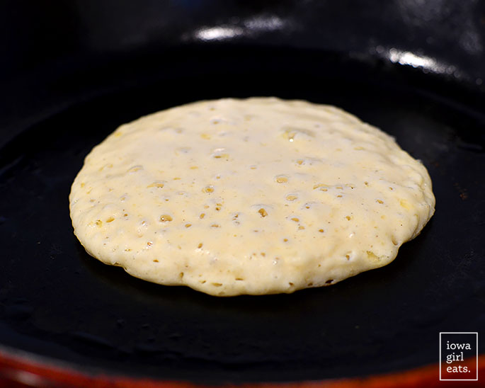 bubbles forming on the top of a gluten free pancake