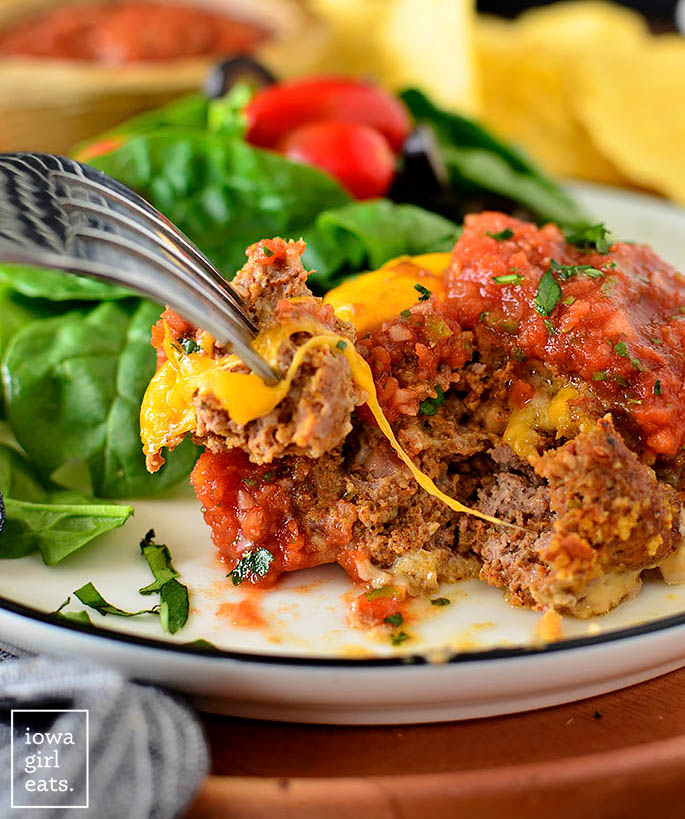 cheesy taco meatloaf with a bite taken out of itbite