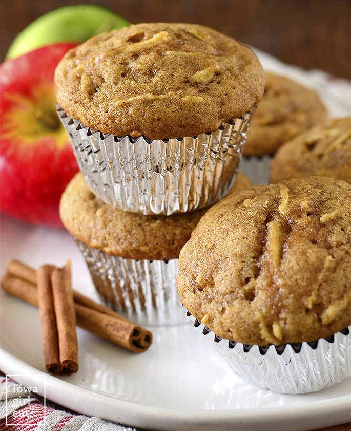 Apple Cinnamon Muffins stacked on top of each other.