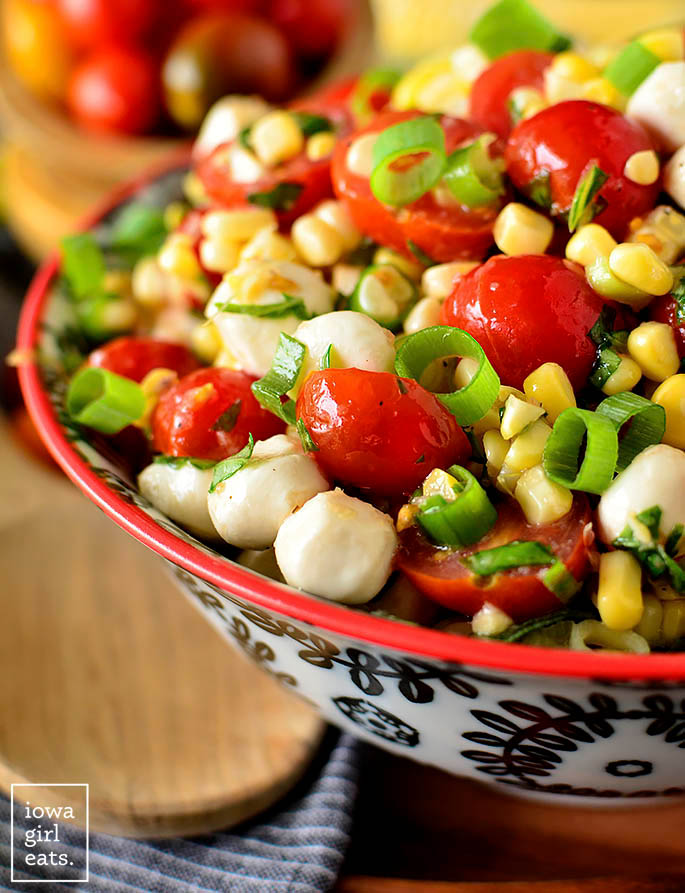 Close up photo of Sweet Corn Caprese Salad in a serving bowl
