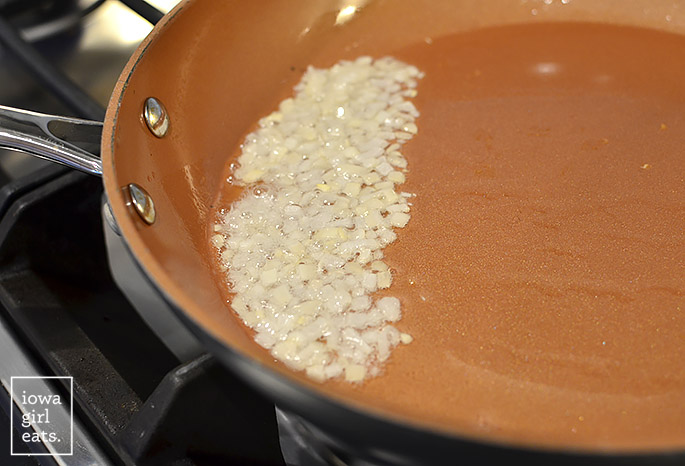 shallots sauteing in a skillet