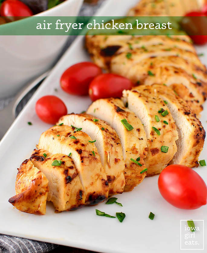 Chicken breast cooked in the air fryer sliced on a platter