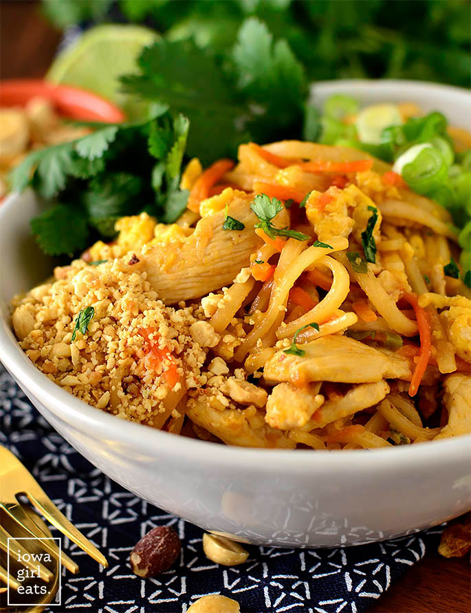 Close up photo of bowl of chicken pad thai