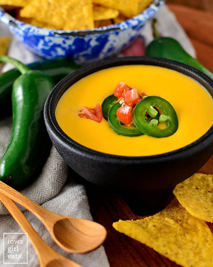 Bowl of homemade nacho cheese sauce with jalapenos