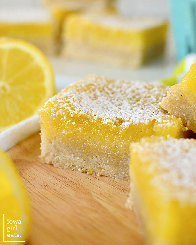 Photo of a gluten free lemon bar showing the glossy filling