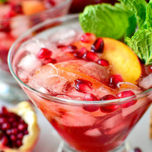 Pomegranate Peach Prosecco Cocktail