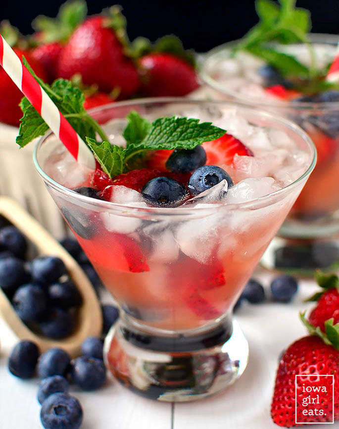 rose sangria with fruit in a cocktail glass
