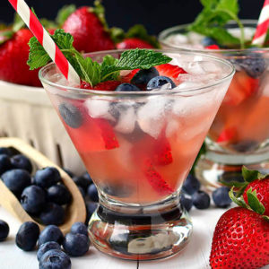 rose sangria with fresh fruit and mint in a glass