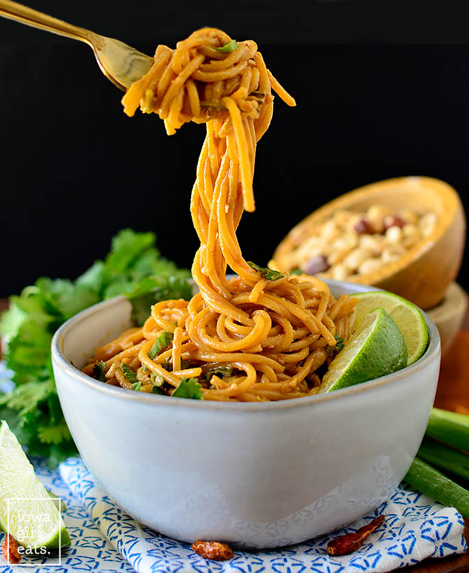 Fork twirling sesame peanut sauce noodles
