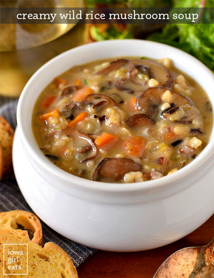 creamy mushroom and wild rice soup in a bowl with crostini