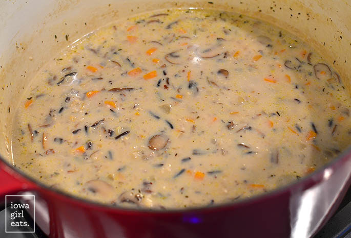 creamy wild rice and mushroom soup in a soup pot