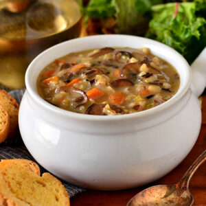 bowl of thick and cozy creamy wild rice mushroom soup