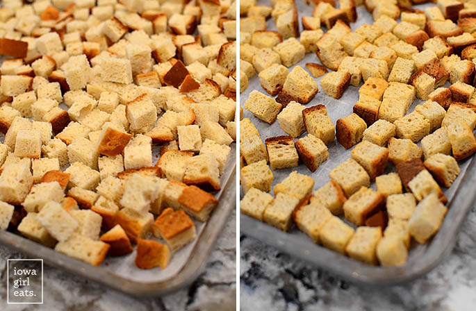 gluten free bread cubes toasting on a baking sheet