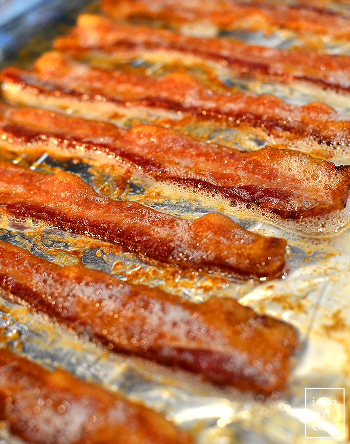 bacon cooked in the oven on a baking sheet