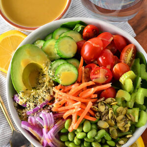 overhead photo of a fresh salad with oil free salad dressing