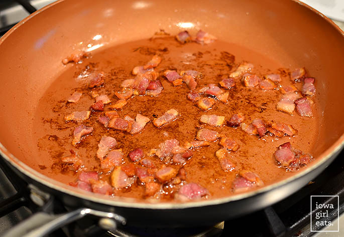 bacon sauting in a skillet